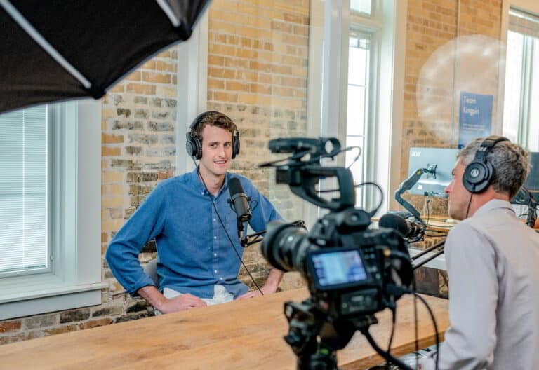 introneur.com Introvert Entrepreneurs - An introverted man speaking in front of a camera